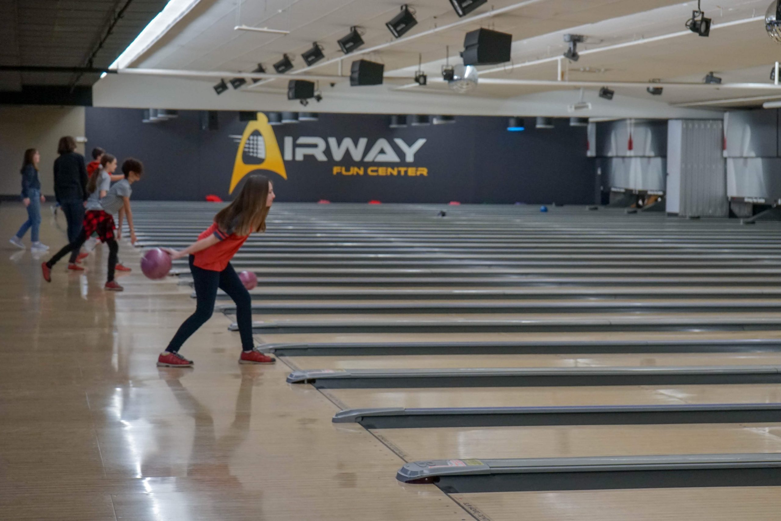 Middle school students bowl at airway lanes