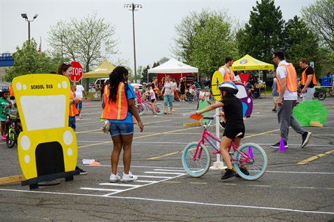 Youth completing the bike safety course at the Bike Rodeo.